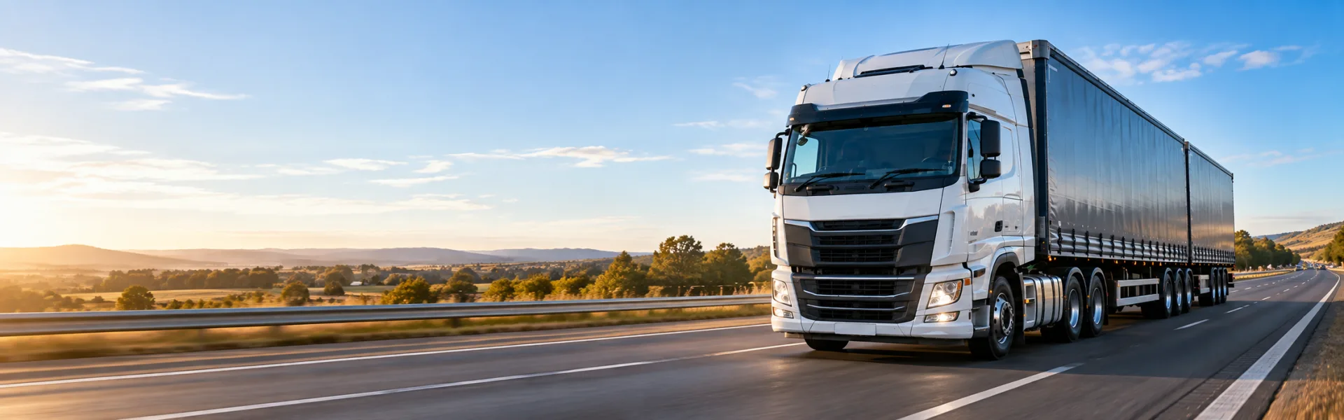 Freight truck on a highway representing fuel costs in road transport