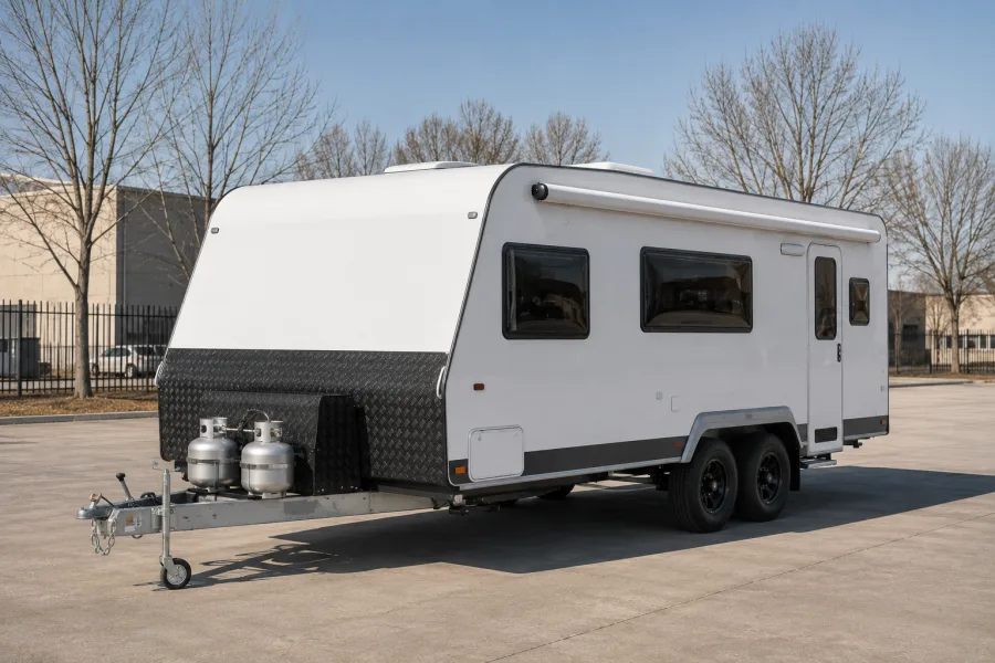 Touring caravan dropped and standing on its jockey wheel at a Canberra yard