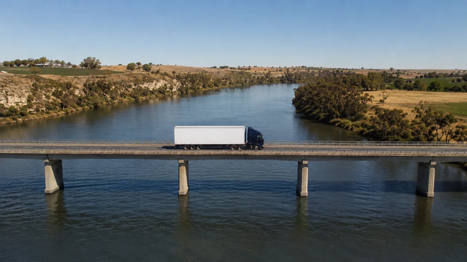 Truck crossing the road bridge over the Murray River at Murray Bridge