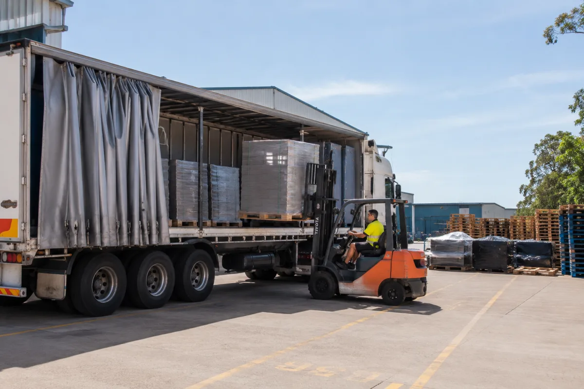 Forklift loading a pallet at a Brisbane depot for the run to the Territory