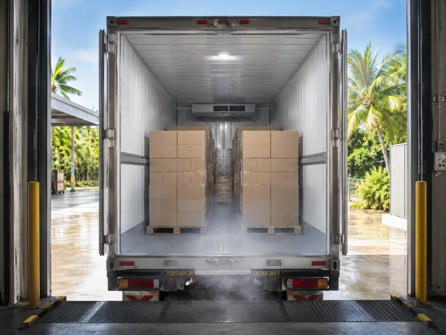 Open refrigerated trailer loaded with chilled cartons in the Top End