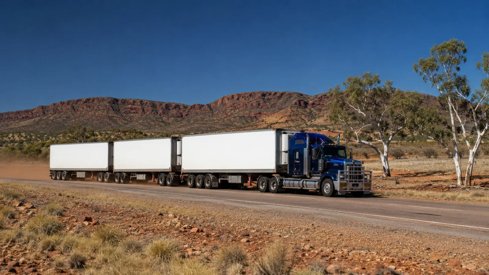 Road train on the Stuart Highway through arid central Australia
