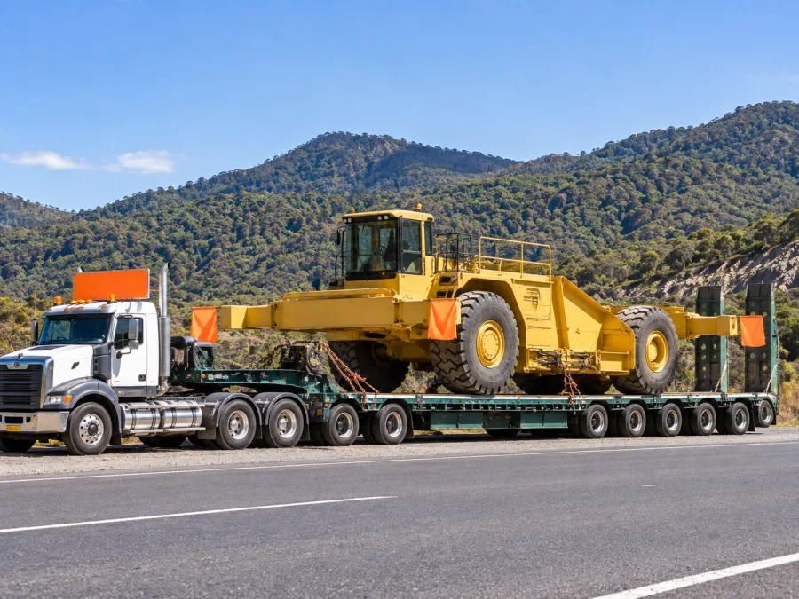 Oversize machine on a low-loader on the mid-north coast